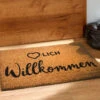 Fußmatte, Herzlich Willkommen