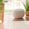 Strick-Pouf, Creme 2 Strick-Pouf, Creme -Einrichtungsgegenstände Geschäft Kiruna Sitzpouf creme rund mil