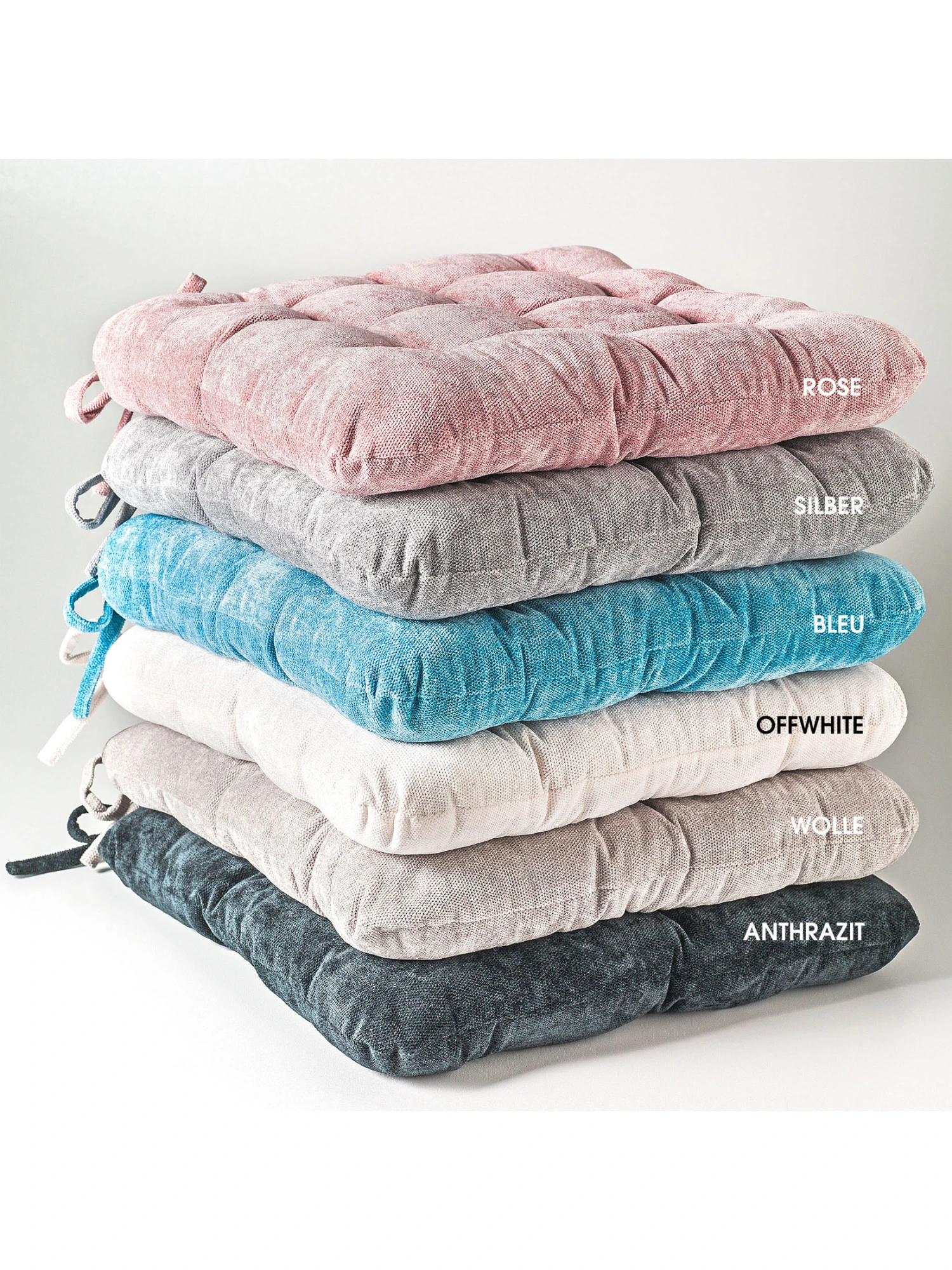 Stuhlkissen, Wolle Stuhlkissen, Wolle -Einrichtungsgegenstände Geschäft Muri Stuhlkissen diverse stapel